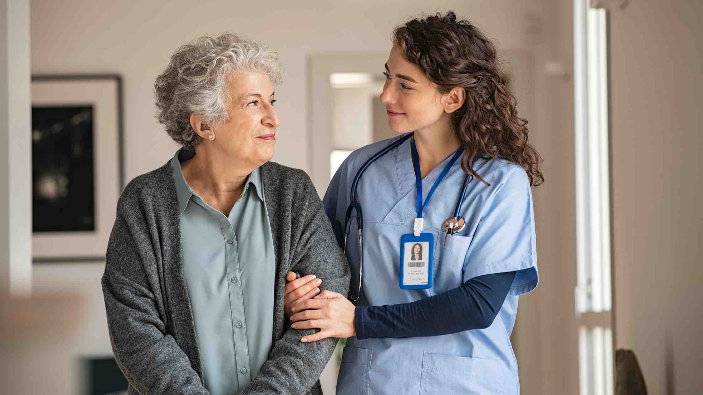 nurse helping patient 