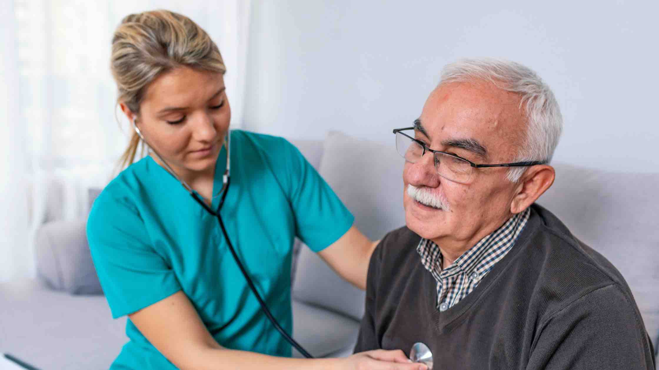 nurse helping patient 