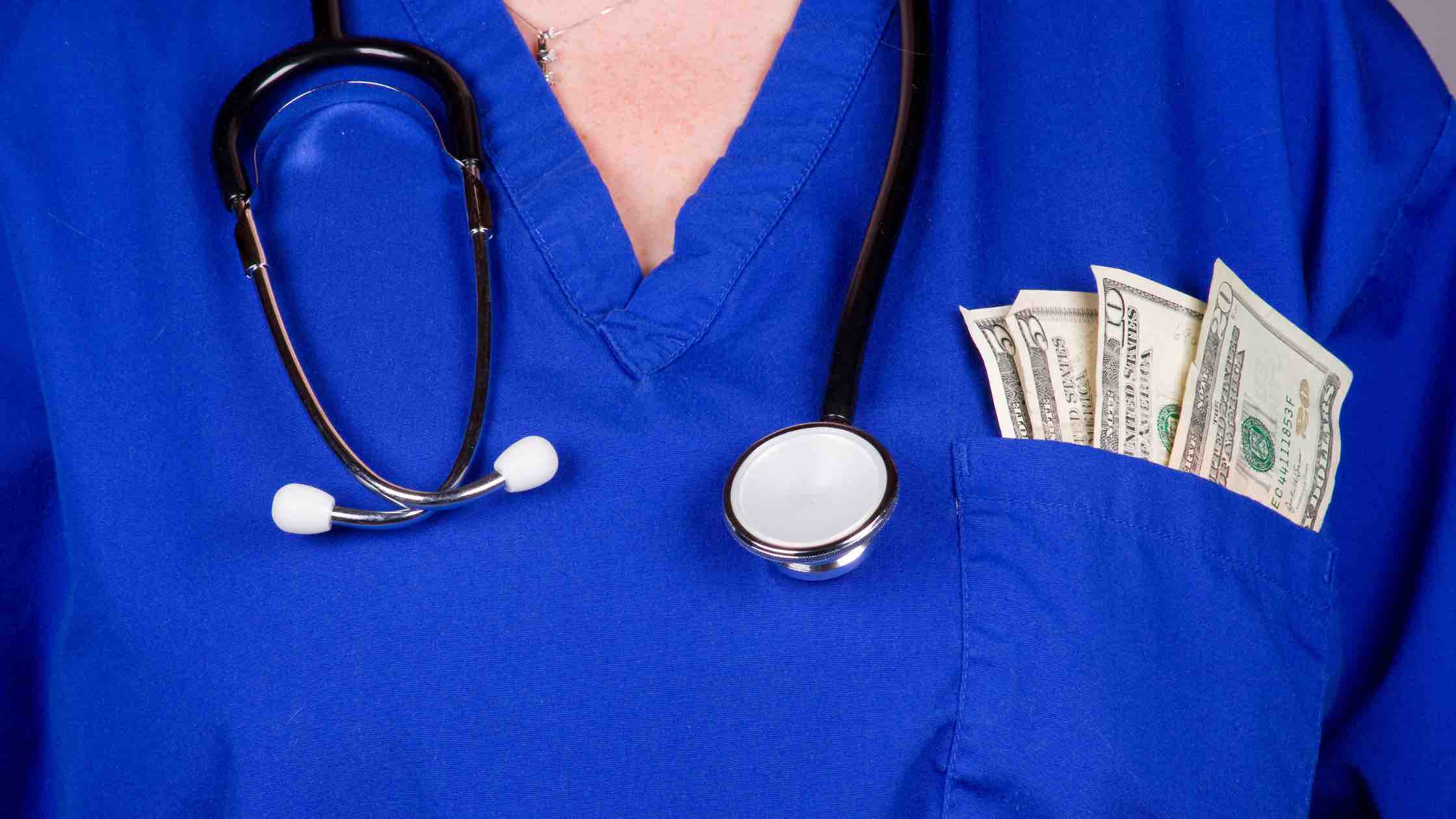 nurse with money in pocket