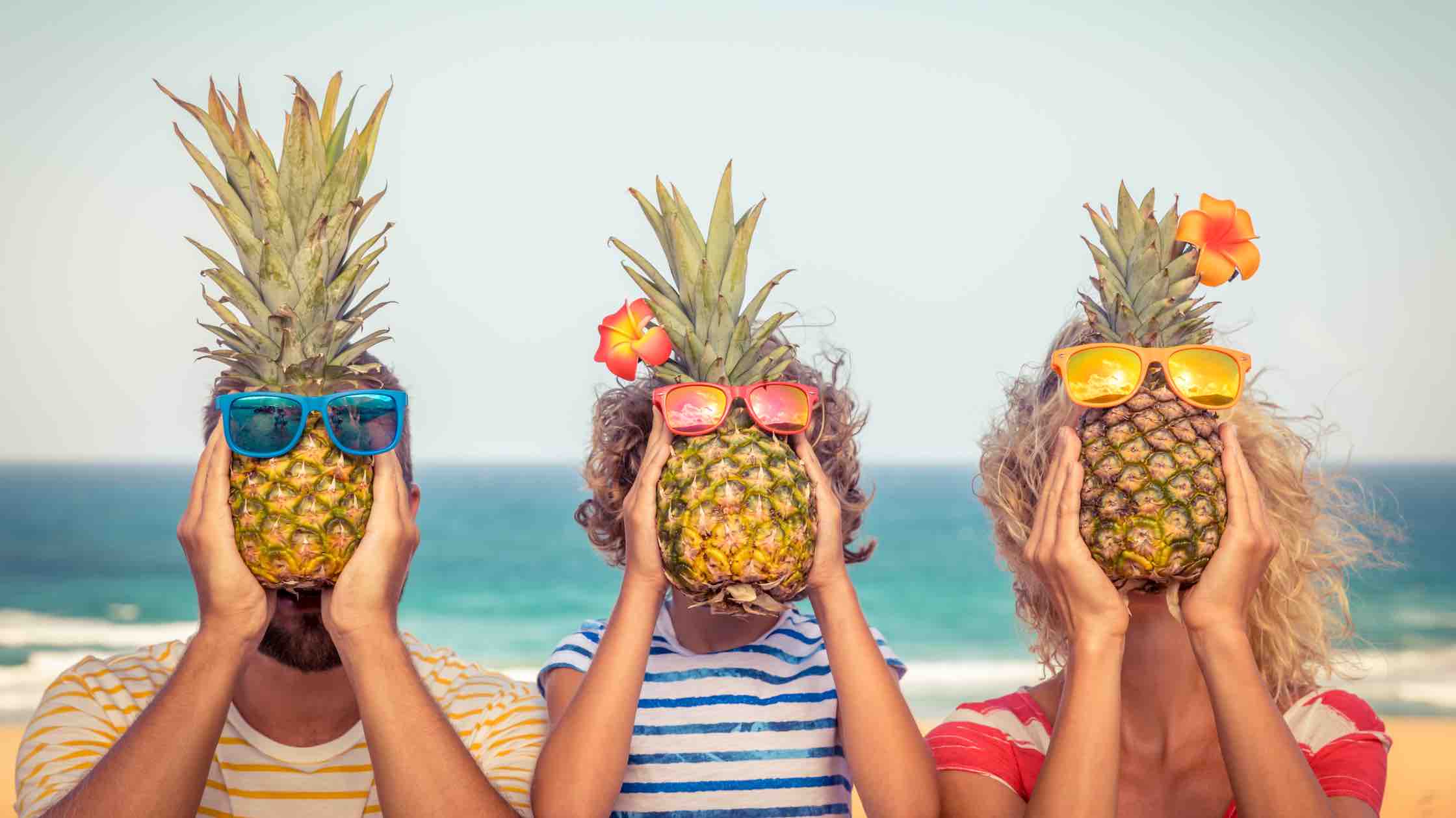 holding a pineapple 