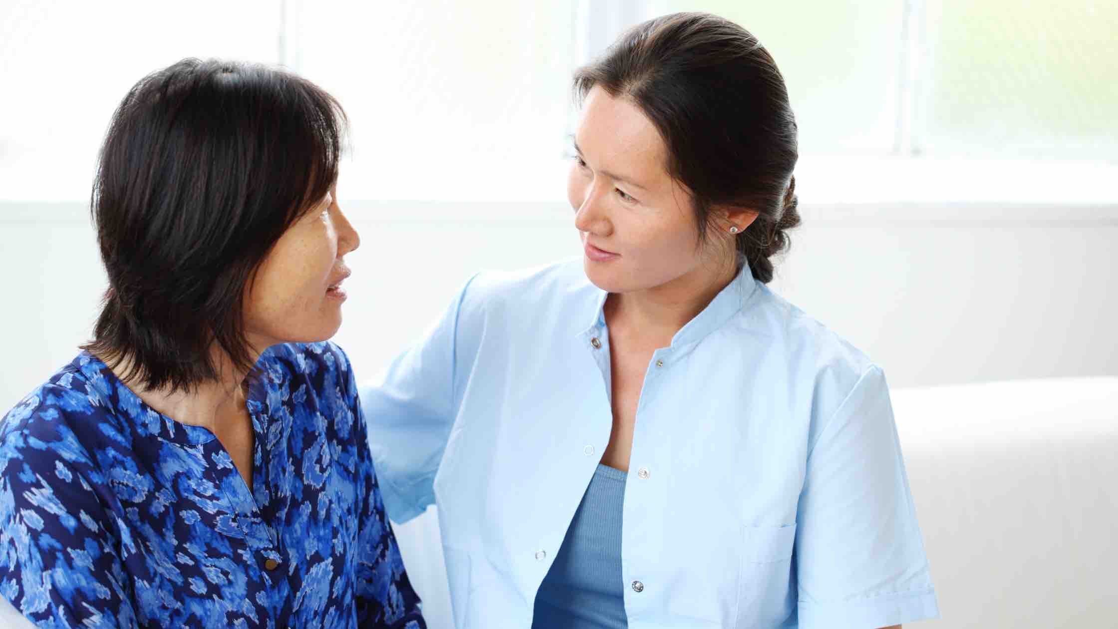 Healthcare Professional helping patient 