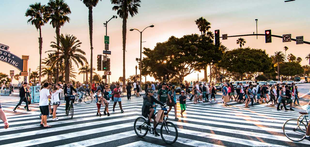 people walking on boardwalk in Santa Monica