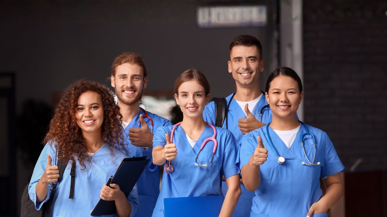 nurses giving thumbs up
