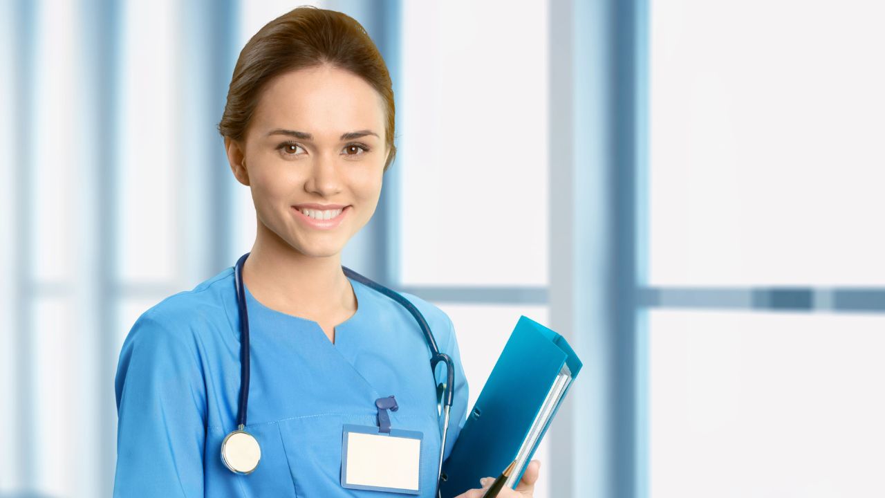 Nurse holding medical documentation